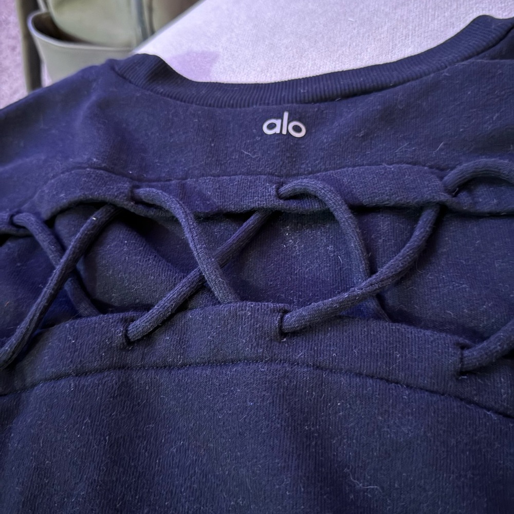 ALO YOGA Lace Up Pullover Sweatshirt in Black